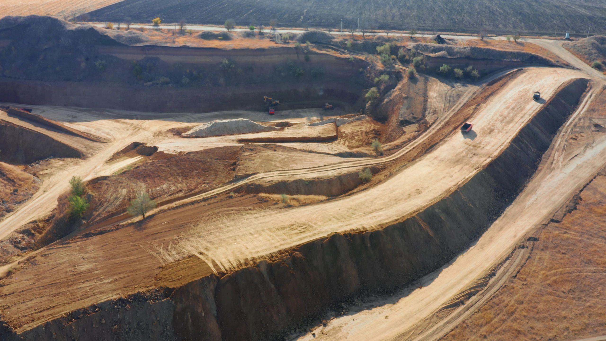 Heavy equipment working on a cleared site